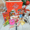 Boîte métal - Livre remplie de friandises et chocolats de Noël