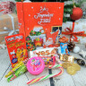 Boîte métal - Livre remplie de friandises et chocolats de Noël