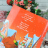 Boîte métal - Livre remplie de friandises et chocolats de Noël